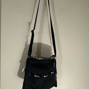 Lesportsac Black Crossbody Bag with Patterned Trim
